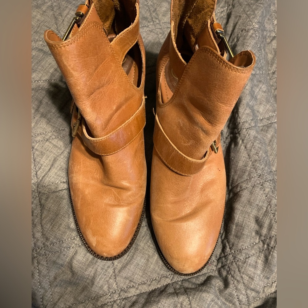 Brown the Sak booties with details on buckles and back of bootie